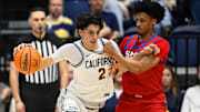 Feb 26, 2025; Berkeley, California, USA; California Golden Bears guard Andrej Stojakovic (2) dribbles against SMU Mustangs guard AJ George (10) in the second half at Haas Pavilion. Mandatory Credit: Eakin Howard-Imagn Images