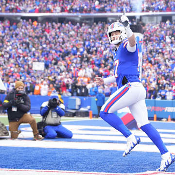 Buffalo Bills quarterback Josh Allen takes the field prior to a game against the Denver Broncos in an AFC wild-card round.