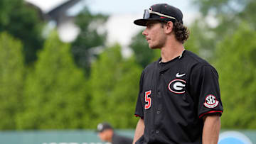 Georgia infielder Christian Adams (5) looks on from first during a NCAA baseball game against Texas A&M in Athens, Ga., on Friday, May 16, 2025.