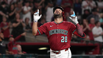 Jul 21, 2025; Phoenix, Arizona, USA; Arizona Diamondbacks third base Eugenio Suarez (28) celebrates after hitting a home run against the Houston Astros in the third inning at Chase Field. Mandatory Credit: Rick Scuteri-Imagn Images
