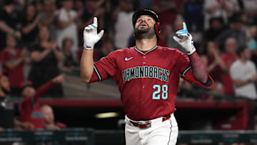 Jul 21, 2025; Phoenix, Arizona, USA; Arizona Diamondbacks third base Eugenio Suarez (28) celebrates after hitting a home run against the Houston Astros in the third inning at Chase Field. Mandatory Credit: Rick Scuteri-Imagn Images