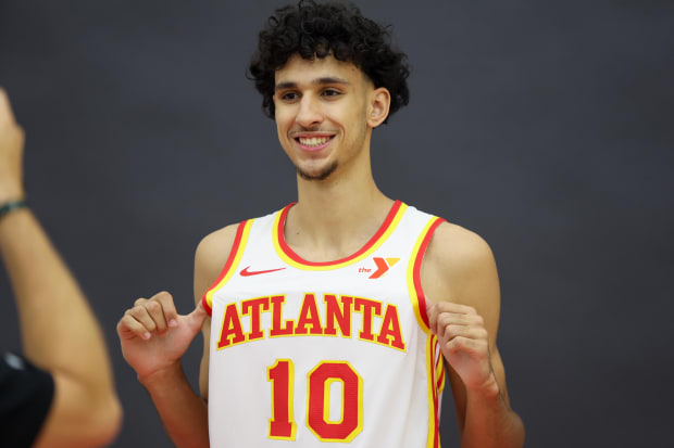 Atlanta Hawks first overall draft pick Zaccharie Risacher (10) poses for a photo at the Emory Sports Medicine Complex. 