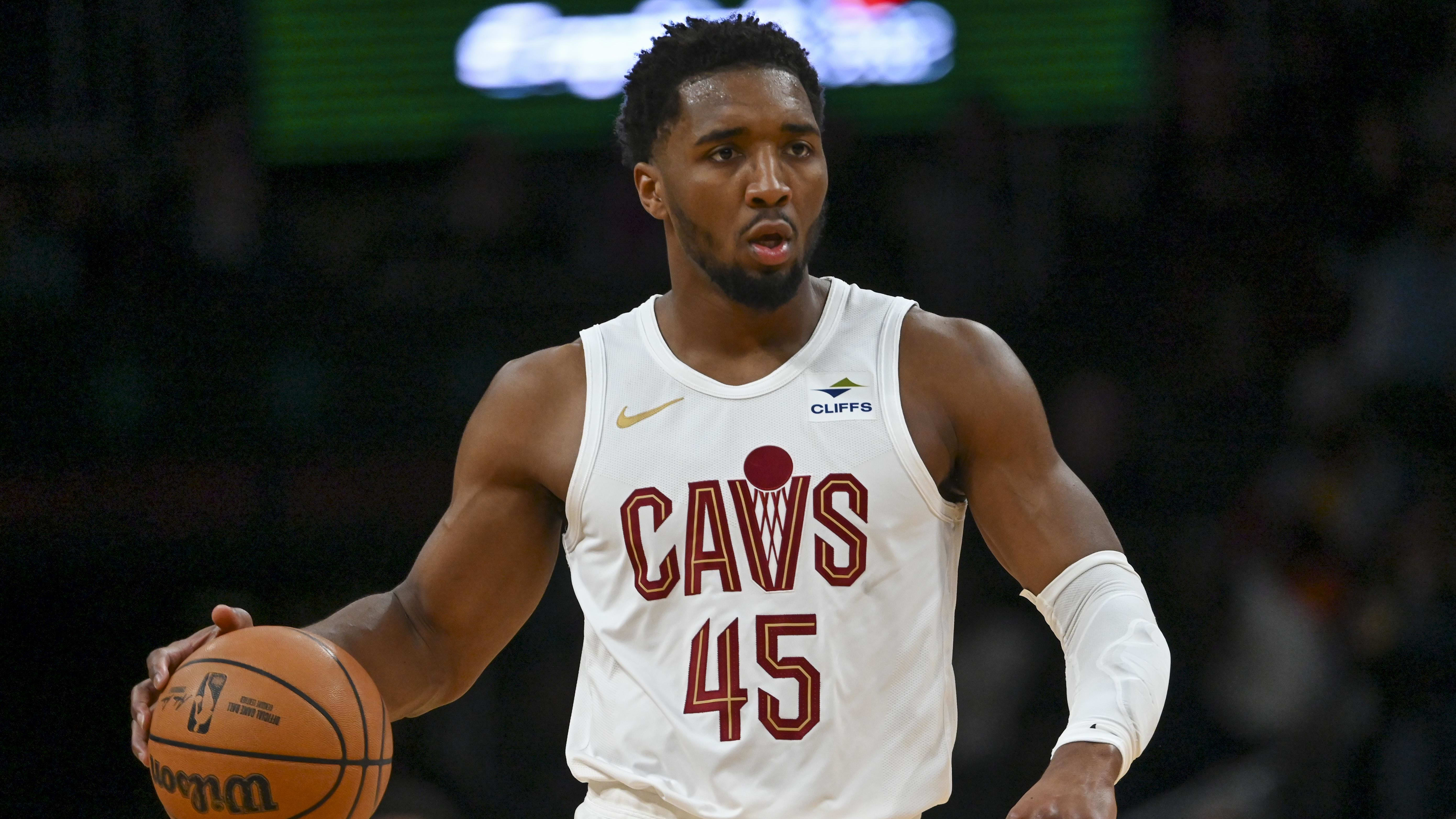 Feb 25, 2024; Washington, District of Columbia, USA; Cleveland Cavaliers guard Donovan Mitchell (45) dribbles up the court during the first half against the Washington Wizards at Capital One Arena.