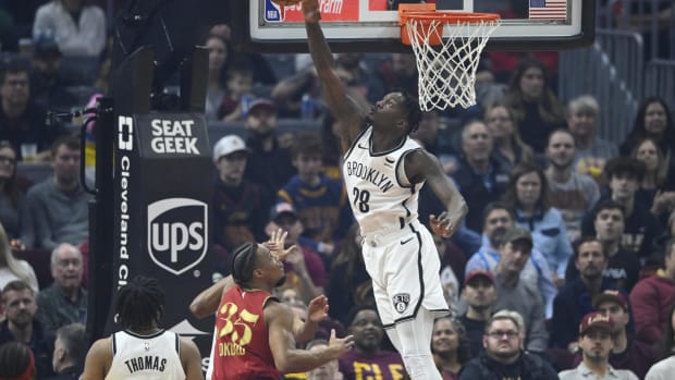 Dorian Finney-Smith blocks a shot in front of the rim