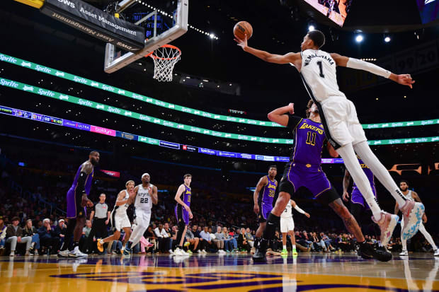 San Antonio Spurs center Victor Wembanyama (1) shoots against Los Angeles Lakers center Jaxson Hayes.