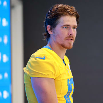 Jul 24, 2024; El Segundo, CA, USA;  Los Angeles Chargers quarterback Justin Herbert (10) speaks to the media after the first day of training camp at The Bolt. Mandatory Credit: Kiyoshi Mio-USA TODAY Sports