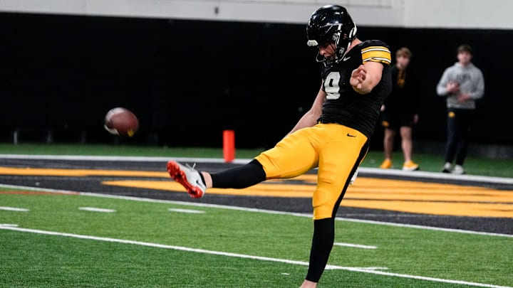 Iowa punter Rhys Dakin (9) punts during practices Thursday, April 3, 2025 in Iowa City, Iowa.