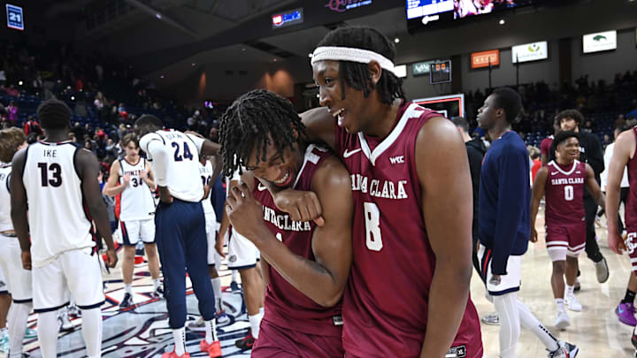 Jan 18, 2025; Spokane, Washington, USA; Santa Clara Broncos guard Tyeree Bryan, left, and Santa Clara Broncos forward Elijah Mahi (8) celebrate after a game against the Gonzaga Bulldogs at McCarthey Athletic Center. Santa Clara Broncos won 103-99. Mandatory Credit: James Snook-Imagn Images