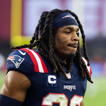 Dec 15, 2024; Glendale, Arizona, USA; New England Patriots safety Kyle Dugger (23) against the Arizona Cardinals at State Farm Stadium. Mandatory Credit: Mark J. Rebilas-Imagn Images