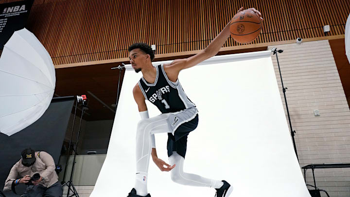 Sep 30, 2024; San Antonio, TX, USA; San Antonio Spurs center Victor Wembanyama (1) poses for photos during Media day at Victory Capital Performance Center in San Antonio. Sep 30, 2024; San Antonio, TX, USA; San Antonio Spurs center Victor Wembanyama (1) poses for photos during Media day at Victory Capital Performance Center in San Antonio.