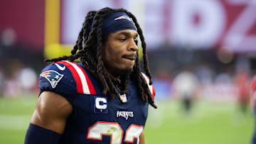 Dec 15, 2024; Glendale, Arizona, USA; New England Patriots safety Kyle Dugger (23) against the Arizona Cardinals at State Farm Stadium. Mandatory Credit: Mark J. Rebilas-Imagn Images