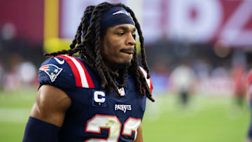 Dec 15, 2024; Glendale, Arizona, USA; New England Patriots safety Kyle Dugger (23) against the Arizona Cardinals at State Farm Stadium. Mandatory Credit: Mark J. Rebilas-Imagn Images