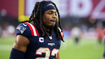 Dec 15, 2024; Glendale, Arizona, USA; New England Patriots safety Kyle Dugger (23) against the Arizona Cardinals at State Farm Stadium. Mandatory Credit: Mark J. Rebilas-Imagn Images