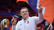 Dec 29, 2024; Champaign, Illinois, USA;  Illinois Fighting Illini head coach Brad Underwood acknowledges the fans before a game with the Chicago State Cougars at State Farm Center. Mandatory Credit: Ron Johnson-Imagn Images