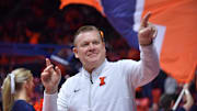 Dec 29, 2024; Champaign, Illinois, USA;  Illinois Fighting Illini head coach Brad Underwood acknowledges the fans before a game with the Chicago State Cougars at State Farm Center. Mandatory Credit: Ron Johnson-Imagn Images