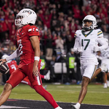 Oct 25, 2025; Cincinnati, Ohio, USA;  Cincinnati Bearcats quarterback Brendan Sorsby (2) runs with the ball for a touchdown against the Baylor Bears in the second half at Nippert Stadium. Mandatory Credit: Aaron Doster-Imagn Images