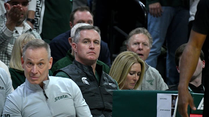Dec 2, 2025; East Lansing, Michigan, USA;  Michigan State head football coach Pat Fitzgerald watches the Spartans defeat the Iowa Hawkeyes at Jack Breslin Student Events Center. Mandatory Credit: Dale Young-Imagn Images