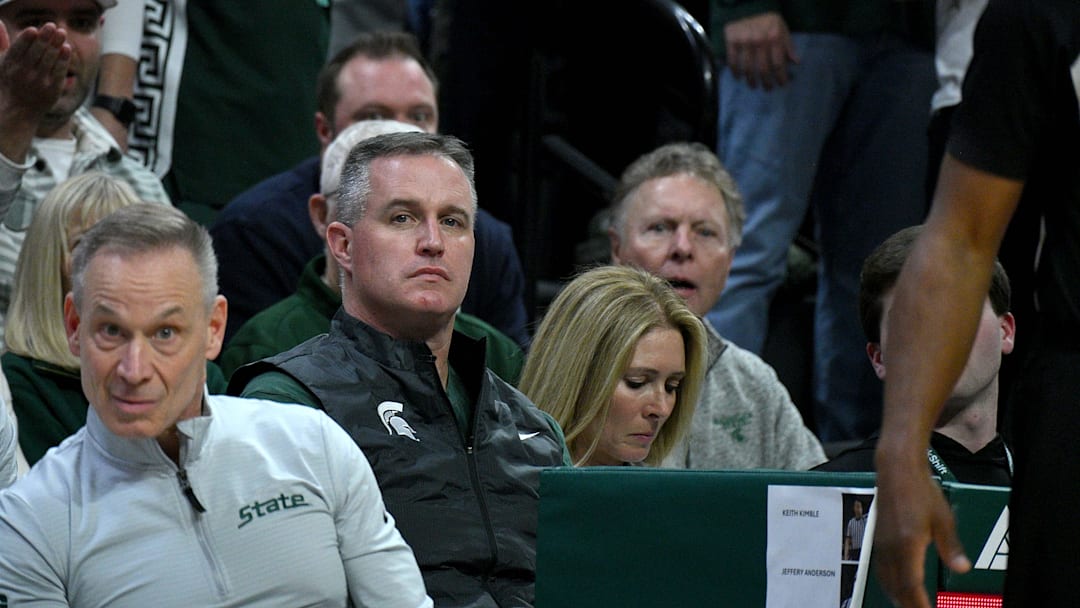 Dec 2, 2025; East Lansing, Michigan, USA;  Michigan State head football coach Pat Fitzgerald watches the Spartans defeat the Iowa Hawkeyes at Jack Breslin Student Events Center. Mandatory Credit: Dale Young-Imagn Images