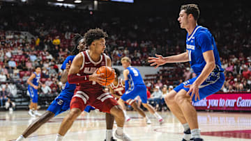 Dec 14, 2024; Tuscaloosa, Alabama, USA; Alabama Crimson Tide guard Mark Sears (1) faces pressure from Creighton Bluejays guard Jamiya Neal (5) and center Ryan Kalkbrenner (11) during the second half at Coleman Coliseum. Mandatory Credit: Will McLelland-Imagn Images
