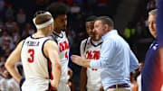 Jan 29, 2025; Oxford, Mississippi, USA; Mississippi Rebels head coach Chris Beard huddles with guard Sean Pedulla (3), forward Jaemyn Brakefield (4), and guard Matthew Murrell (11) during the second half against the Texas Longhorns  at The Sandy and John Black Pavilion at Ole Miss. Mandatory Credit: Petre Thomas-Imagn Images
