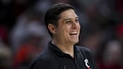 Dec 22, 2024; Cincinnati, Ohio, USA;  Cincinnati Bearcats head coach Wes Miller smiles as he works the sideline against the Grambling State Tigers in the second half at Fifth Third Arena. Mandatory Credit: Aaron Doster-Imagn Images