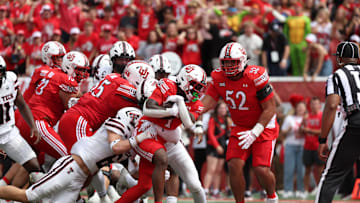 Sep 20, 2025; Salt Lake City, Utah, USA; Utah Utes running back Wayshawn Parker (1) runs for a touchdown as Texas Tech Red Raiders linebacker John Curry (6) defends during the fourth quarter at Rice-Eccles Stadium. Mandatory Credit: Rob Gray-Imagn Images