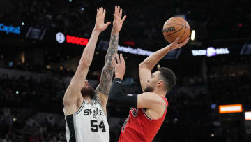 Jan 13, 2024; San Antonio, Texas, USA;  Chicago Bulls guard Zach LaVine (8) shoots over San Antonio Spurs forward Sandro Mamukelashvili (54) in the first half at Frost Bank Center. Mandatory Credit: Daniel Dunn-USA TODAY Sports