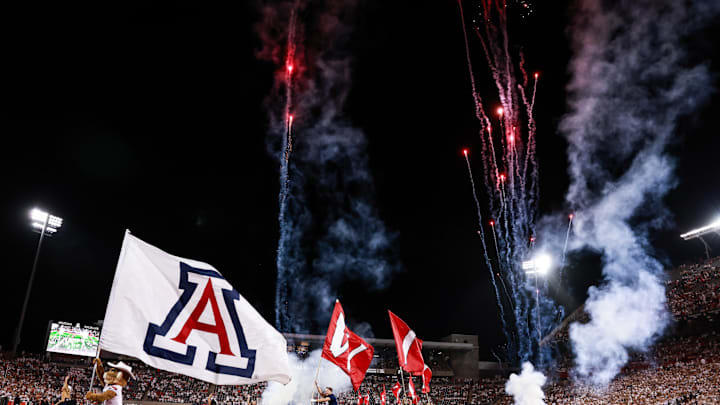 Aug 31, 2024; Tucson, Arizona, USA; Arizona Wildcats team run out at beginning of game at Arizona Stadium. Mandatory Credit: Aryanna Frank-Imagn Images