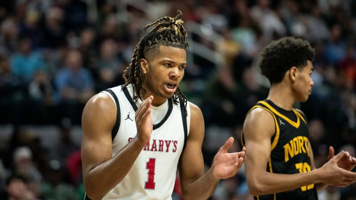 Orchard Lake St. Mary's Trey McKenney celebrates a big play during the Division 1 boys basketball state championship on Saturday, March 16, 2024, at Michigan State University's Breslin Center.