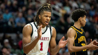 Orchard Lake St. Mary's Trey McKenney celebrates a big play during the Division 1 boys basketball state championship on Saturday, March 16, 2024, at Michigan State University's Breslin Center.