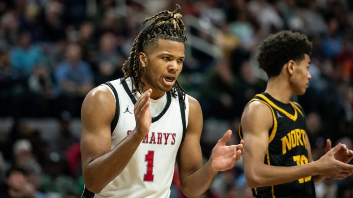 Orchard Lake St. Mary's Trey McKenney celebrates a big play during the Division 1 boys basketball state championship on Saturday, March 16, 2024, at Michigan State University's Breslin Center.