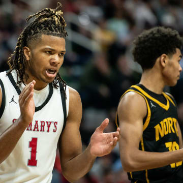 Orchard Lake St. Mary's Trey McKenney celebrates a big play during the Division 1 boys basketball state championship on Saturday, March 16, 2024, at Michigan State University's Breslin Center.