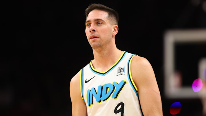 Dec 19, 2024; Phoenix, Arizona, USA; Indiana Pacers guard T.J. McConnell (9) against the Phoenix Suns at Footprint Center. Mandatory Credit: Mark J. Rebilas-Imagn Images