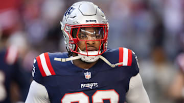 Dec 15, 2024; Glendale, Arizona, USA; New England Patriots linebacker Anfernee Jennings (33) against the Arizona Cardinals at State Farm Stadium. Mandatory Credit: Mark J. Rebilas-Imagn Images