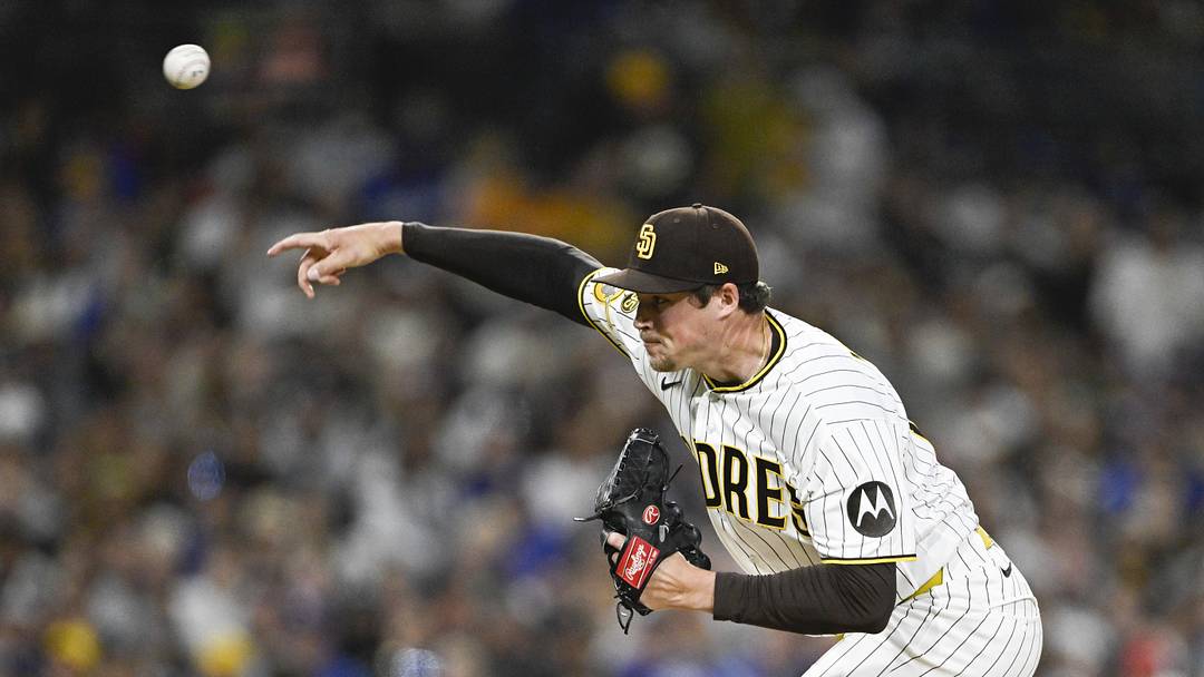 San Diego Padres pitcher Mason Miller (22) throws a pitch during the ninth inning against the Los Angeles Dodgers at Petco Park on May 18, 2026.