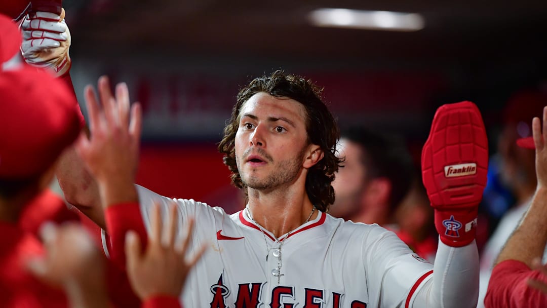 Sep 9, 2025; Anaheim, California, USA; Los Angeles Angels center fielder Bryce Teodosio (22) is greeted after scoring a run against the Minnesota Twins during the sixth inning at Angel Stadium. Mandatory Credit: Gary A. Vasquez-Imagn Images