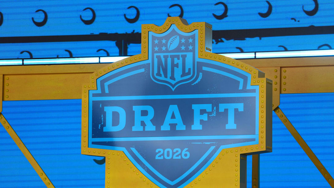 The 2026 NFL Draft logo on the theater stage at Acrisure Stadium.