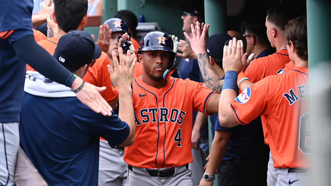 Aug 11, 2024; Boston, Massachusetts, USA; Houston Astros right fielder Pedro Leon (4) celebrates scoring a run on a three-run home run by third baseman Alex Bregman (2) (not pictured) during the fifth inning against the Boston Red Sox at Fenway Park. Aug 11, 2024; Boston, Massachusetts, USA; Houston Astros right fielder Pedro Leon (4) celebrates scoring a run on a three-run home run by third baseman Alex Bregman (2) (not pictured) during the fifth inning against the Boston Red Sox at Fenway Park.