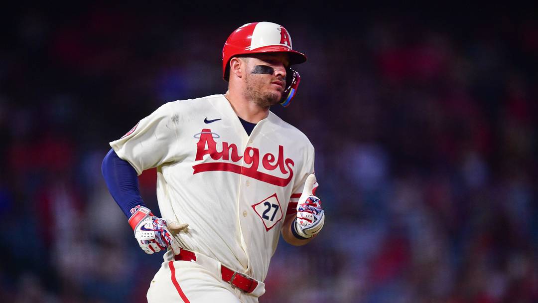 Jul 28, 2026; Anaheim, California, USA; Los Angeles Angels center fielder Mike Trout (27) runs after hitting a single against the Houston Astros during the fifth inning at Angel Stadium. Mandatory Credit: Gary A. Vasquez-Imagn Images