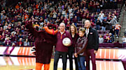Feb 15, 2025; Blacksburg, Virginia, USA;  Virginia Tech Hokies head coach Mike Young gets acknowledged for his 400th career win before the game against Virginia the Cavaliers at Cassell Coliseum. Mandatory Credit: Brian Bishop-Imagn Images