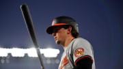 Aug 27, 2024; Los Angeles, California, USA; Baltimore Orioles catcher Adley Rutschman (35) on deck before hitting against the Los Angeles Dodgers during the third inning at Dodger Stadium. Mandatory Credit: Gary A. Vasquez-USA TODAY Sports