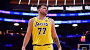Mar 4, 2025; Los Angeles, California, USA; Los Angeles Lakers guard Luka Doncic (77) reacts during the first half at Crypto.com Arena. Mandatory Credit: Gary A. Vasquez-Imagn Images