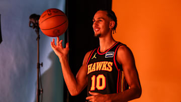 Hawks forward Zaccharie Risacher (10) poses during 2025 Media Day. 