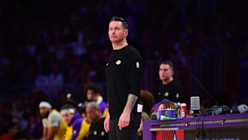 Dec 31, 2024; Los Angeles, California, USA; Los Angeles Lakers head coach JJ Redick watches game action against the Cleveland Cavaliers during the first half at Crypto.com Arena. Mandatory Credit: Gary A. Vasquez-Imagn Images