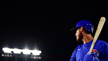 Sep 9, 2024; Los Angeles, California, USA; Chicago Cubs right fielder Cody Bellinger (24) on deck before hitting against the Los Angeles Dodgers during the fourth inning at Dodger Stadium. Mandatory Credit: Gary A. Vasquez-Imagn Images