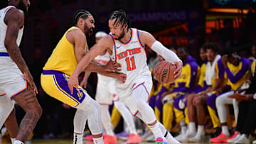 Mar 6, 2025; Los Angeles, California, USA; New York Knicks guard Jalen Brunson (11) moves the ball against Los Angeles Lakers guard Gabe Vincent (7) during the second half at Crypto.com Arena. Mandatory Credit: Gary A. Vasquez-Imagn Images