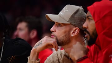 Jan 25, 2024; Los Angeles, California, USA; Chicago Bulls guard Zach LaVine (8) watches game action against the Los Angeles Lakers during the second half at Crypto.com Arena. Mandatory Credit: Gary A. Vasquez-USA TODAY Sports