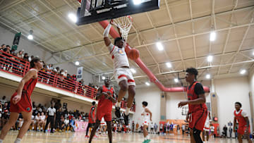 July 3, 2023; North Augusta, S.C., USA; Strive for Greatness Tee Bartlett (23) dunks the ball during the E16 Strive for Greatness and Expressions game at the first day of the Peach Jam at Riverview Park Activities Center. Strive for Greatness defeated Expressions 78-69. Mandatory Credit: Katie Goodale-USA TODAY Network
