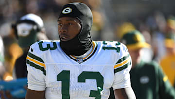 Nov 12, 2023; Pittsburgh, Pennsylvania, USA;  Green Bay Packers wide receiver Dontayvion Wicks (13) on the sidelines during a game against the Pittsburgh Steelers at Acrisure Stadium. Mandatory Credit: Philip G. Pavely-Imagn Images