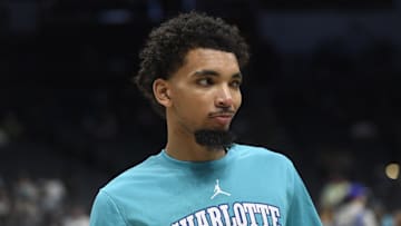 Dec 2, 2023; Charlotte, North Carolina, USA;  Charlotte Hornets guard James Bouknight (2) warms up before the game against the Minnesota Timberwolves at the Spectrum Center. Mandatory Credit: Sam Sharpe-Imagn Images